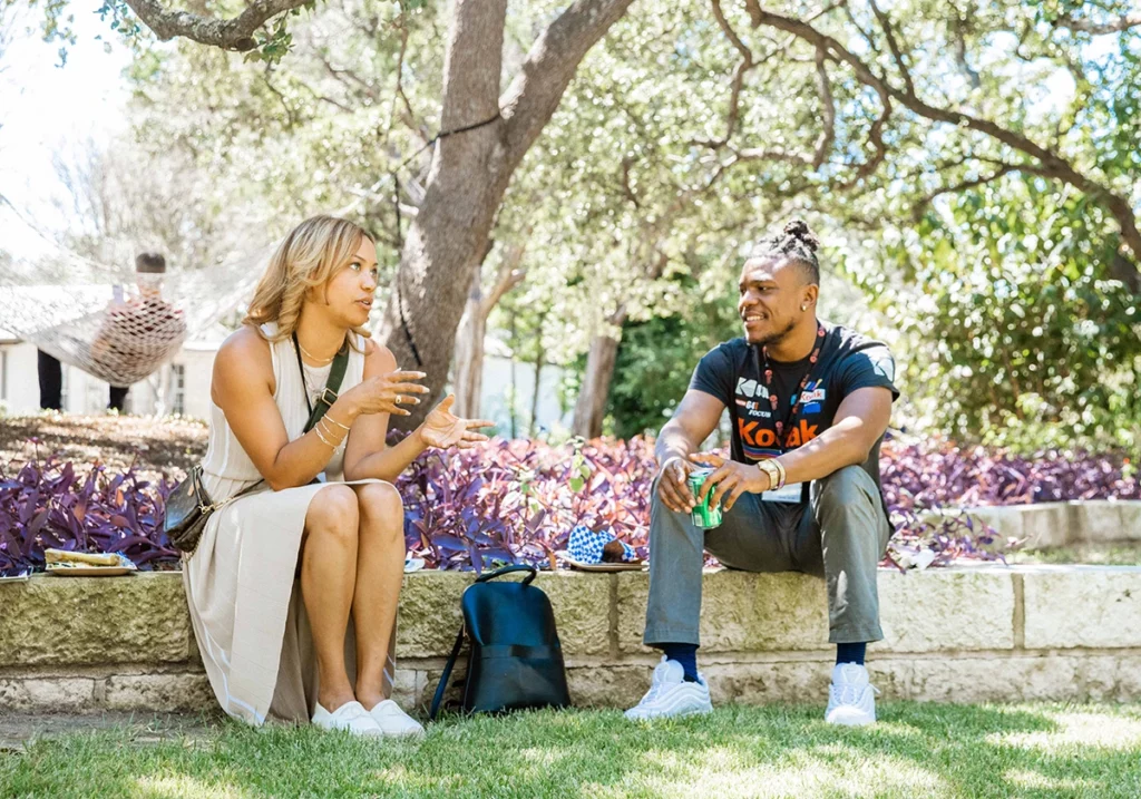 Chatting by a flower garden